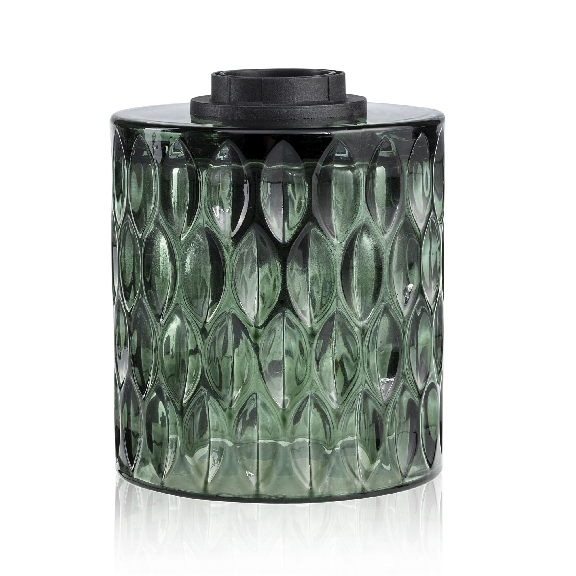 Green glass container with textured pattern and black lid, decorative home accessory