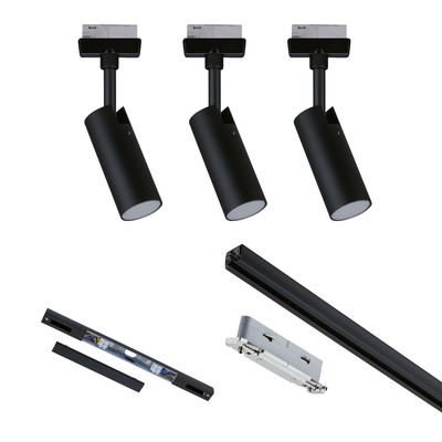 Drie zwarte LED-spotlights met railsysteem en accessoires voor flexibele binnenverlichting.