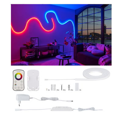 Colorful LED light strip with remote control and accessories for customizable room lighting.