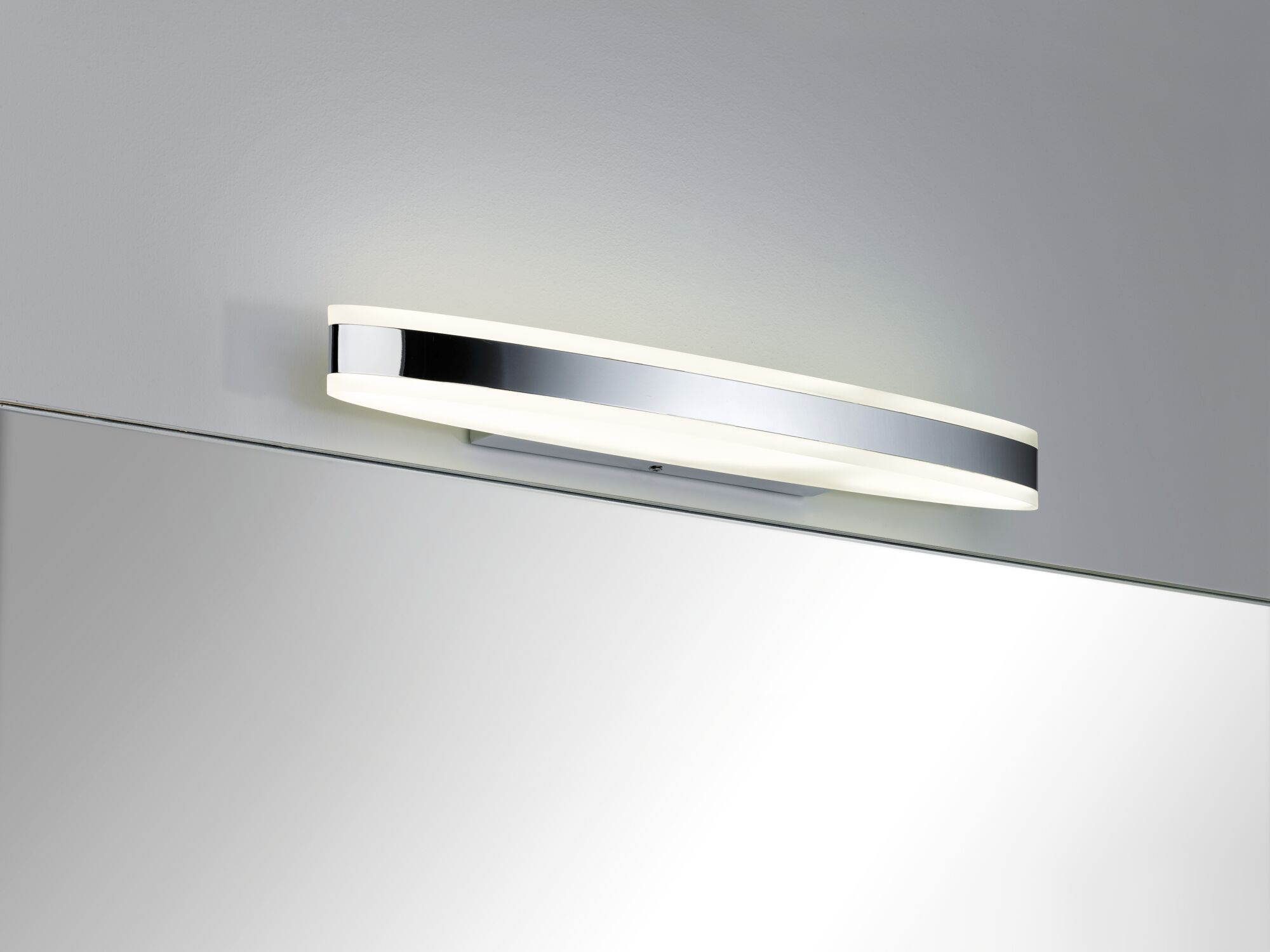 Modern chrome LED wall light with opal diffuser above mirror for bathroom lighting