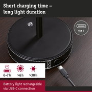 Black round rechargeable table lamp with USB-C port and long LED light duration for home lighting