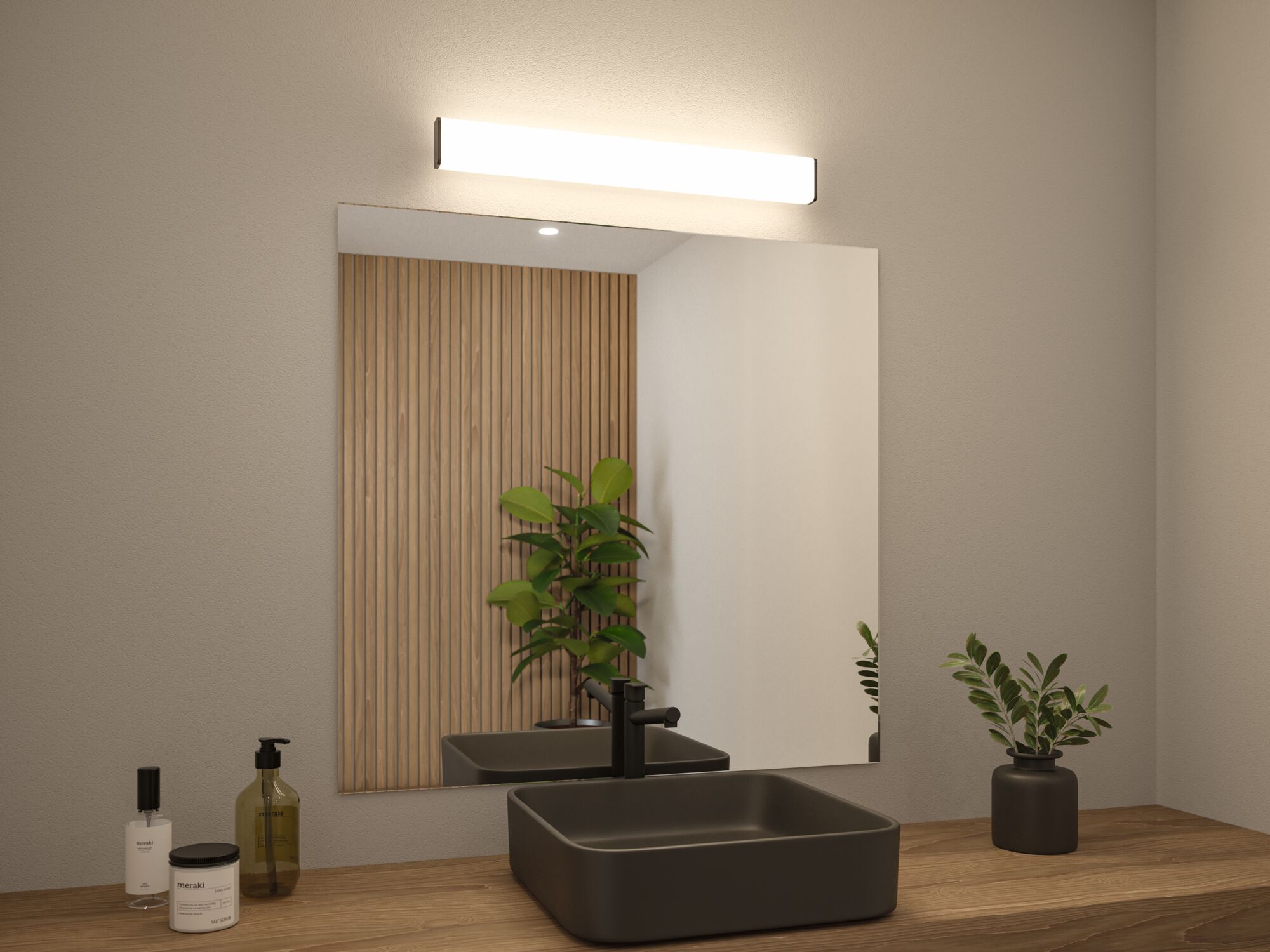 Salle de bain moderne avec lavabo en céramique noir, plan de travail en bois et éclairage miroir LED.