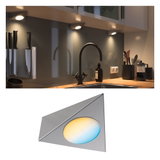 Triangular LED under-cabinet light in brushed aluminum with warm white and blue light for kitchen lighting