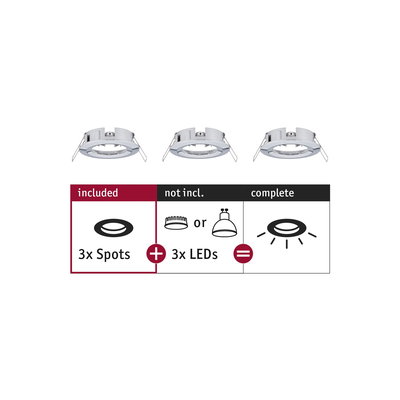 Three white metal recessed spotlights without LEDs, setup for LED spot lighting.