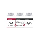Three white metal recessed spotlights without LEDs, setup for LED spot lighting.