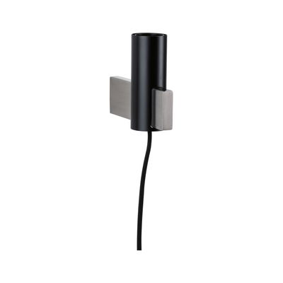 Modern black metal wall spotlight with brushed stainless steel mount and fabric cable for accent lighting