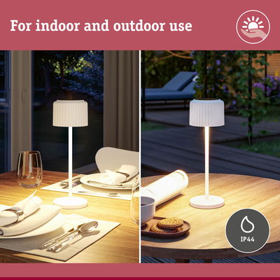White LED table lamp with fabric shade on wooden table, suitable for indoor and outdoor use with IP44 rating