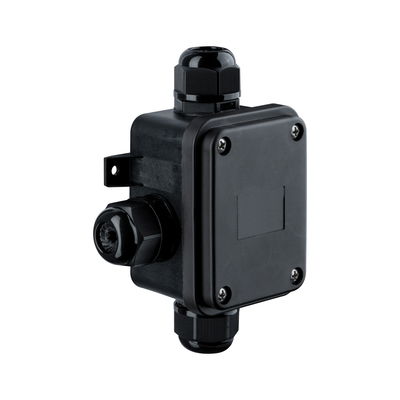 Black plastic junction box with cable glands for electrical wiring installations