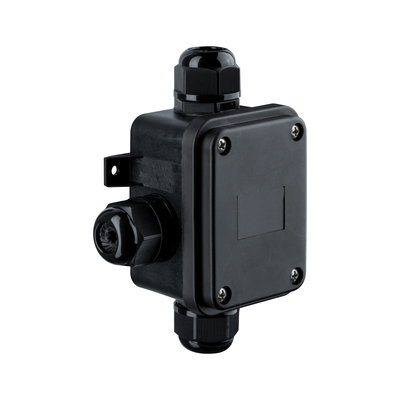 Black plastic junction box with cable glands for electrical wiring installations