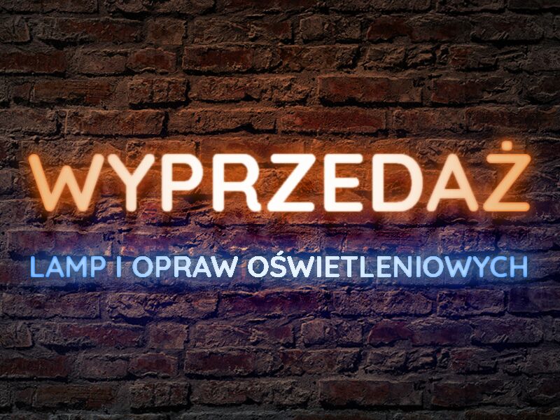 Neon sign reading 'Wyprzedaż' in orange with blue text below on brick wall for lighting sale