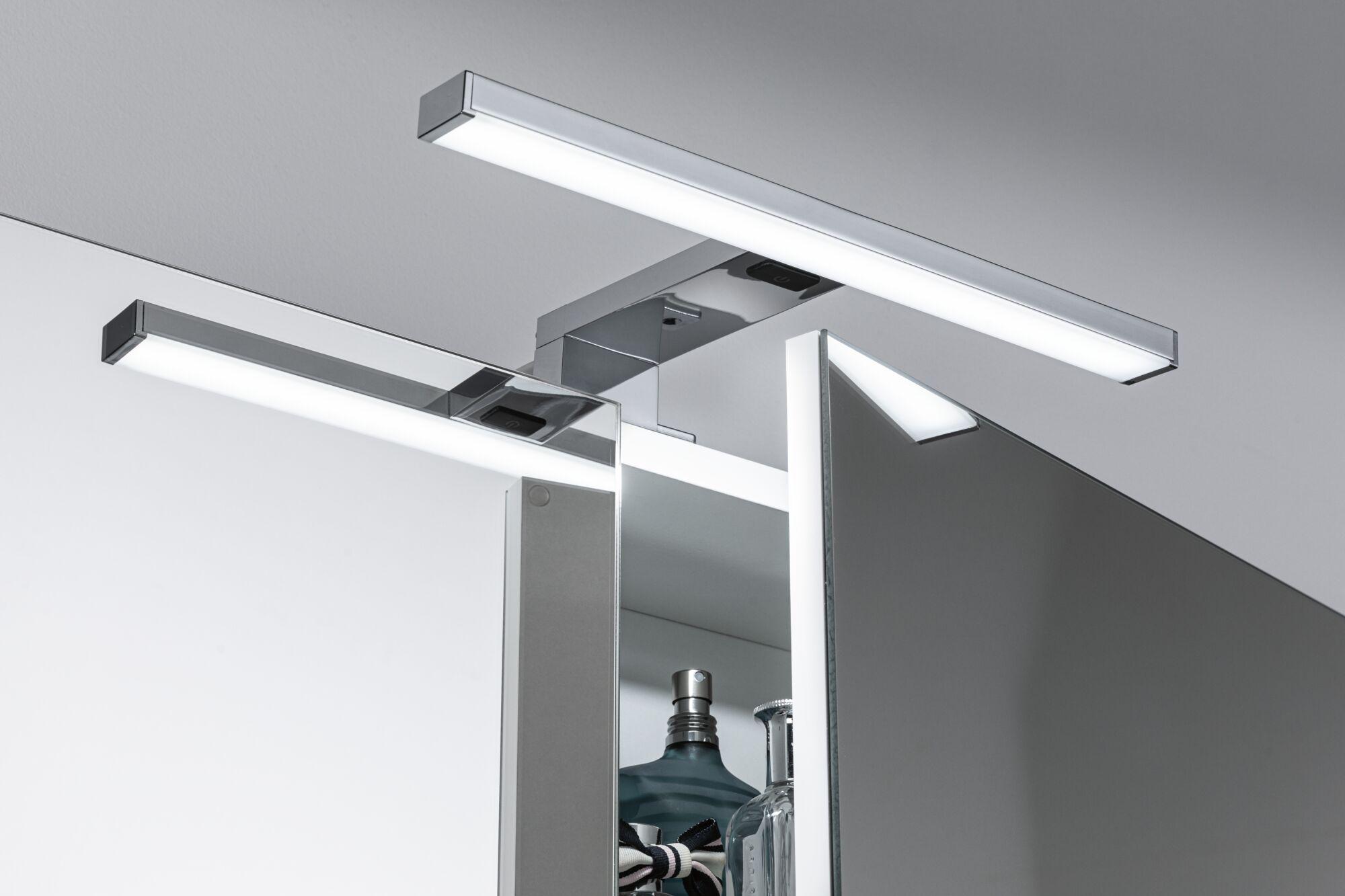Modern chrome LED mirror light with white illumination for bathroom and living space lighting