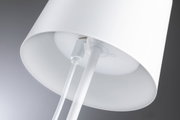 Close-up of white metal lampshade with cable and mount for LED lighting fixture