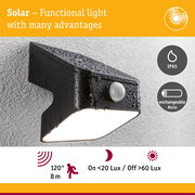 Black solar outdoor light made of plastic with motion sensor and IP65 rating for garden lighting