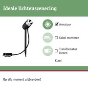 Zwarte LED-tuinschijnwerper met grondpen en kabel voor flexibele buitenverlichting.