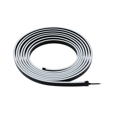 Flexible black LED light strip with white illumination surface for modern room lighting.