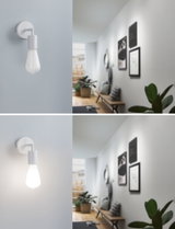 Modern white wall spotlight with LED bulb in hallway featuring wooden bench and plants, lighting concept.