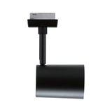 Black metal LED spotlight with cylindrical head for track lighting, modern indoor lighting solution