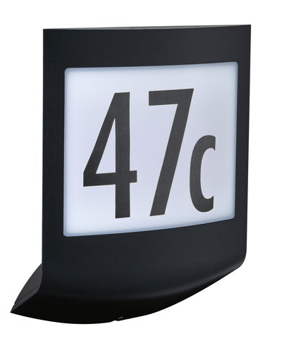 Black metal house number sign with white background and black digits 47c for outdoor lighting