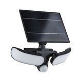 Black solar light with three white LED panels and motion sensor for outdoor use