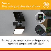 Black solar outdoor light with integrated compass and spirit level for easy mounting and installation