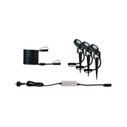 Trois projecteurs LED de jardin noirs avec piquets, câble et transformateur blanc pour éclairage extérieur