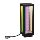 Black rectangular LED outdoor light with multicolored glass panels and cable connection for garden lighting
