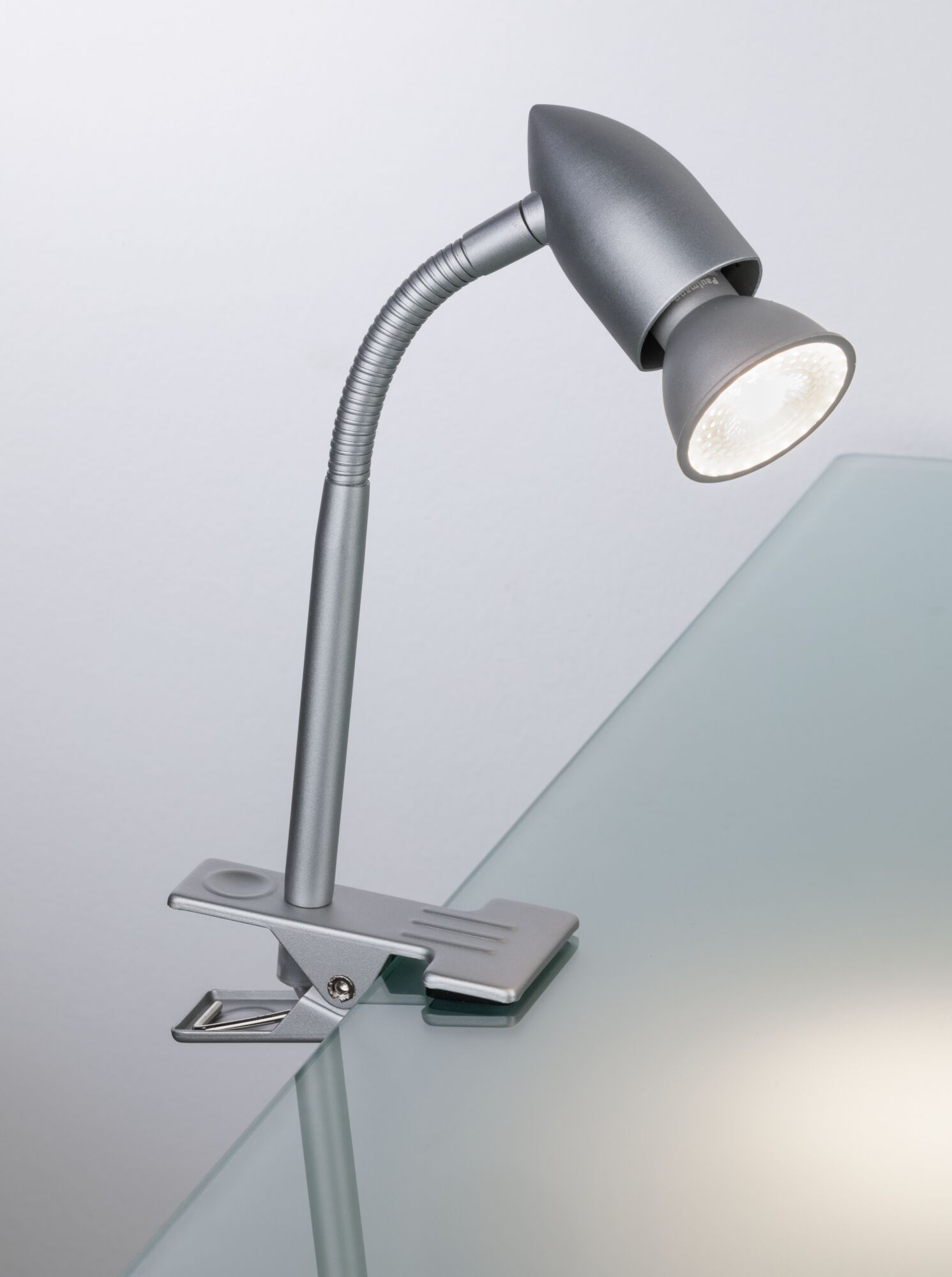 Silver metal LED clip lamp with flexible neck for desk lighting and reading