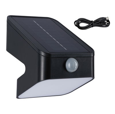 Black solar wall light with motion sensor and USB charging cable, weatherproof outdoor lighting