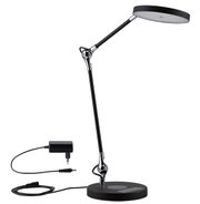 Modern black LED desk lamp with round light head and adjustable arm made of metal and plastic.