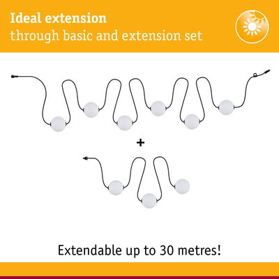 Extendable LED string lights with white globes and black cable, ideal for decorative lighting up to 30 meters