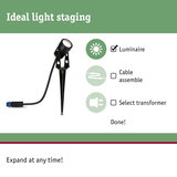 Black LED outdoor spotlight with ground spike for garden lighting and outdoor light staging
