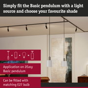 Modern white metal pendant light with black cable in living room, interior lighting concept