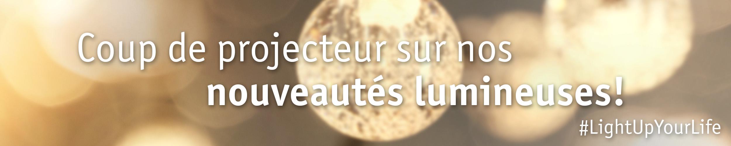 Bannière avec lumières blanches chaudes floues mettant en avant les nouveautés lumineuses.