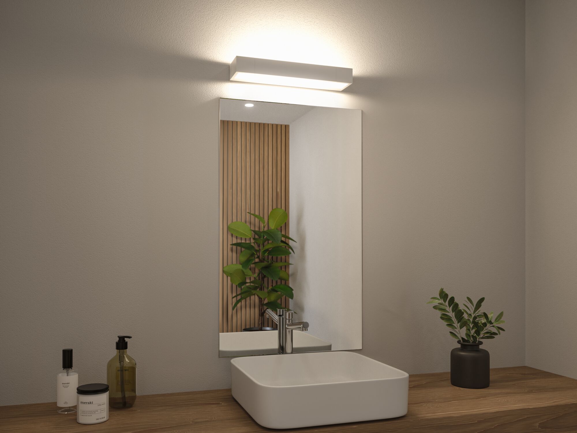 Modern white sink on wooden countertop with rectangular mirror and white LED wall light