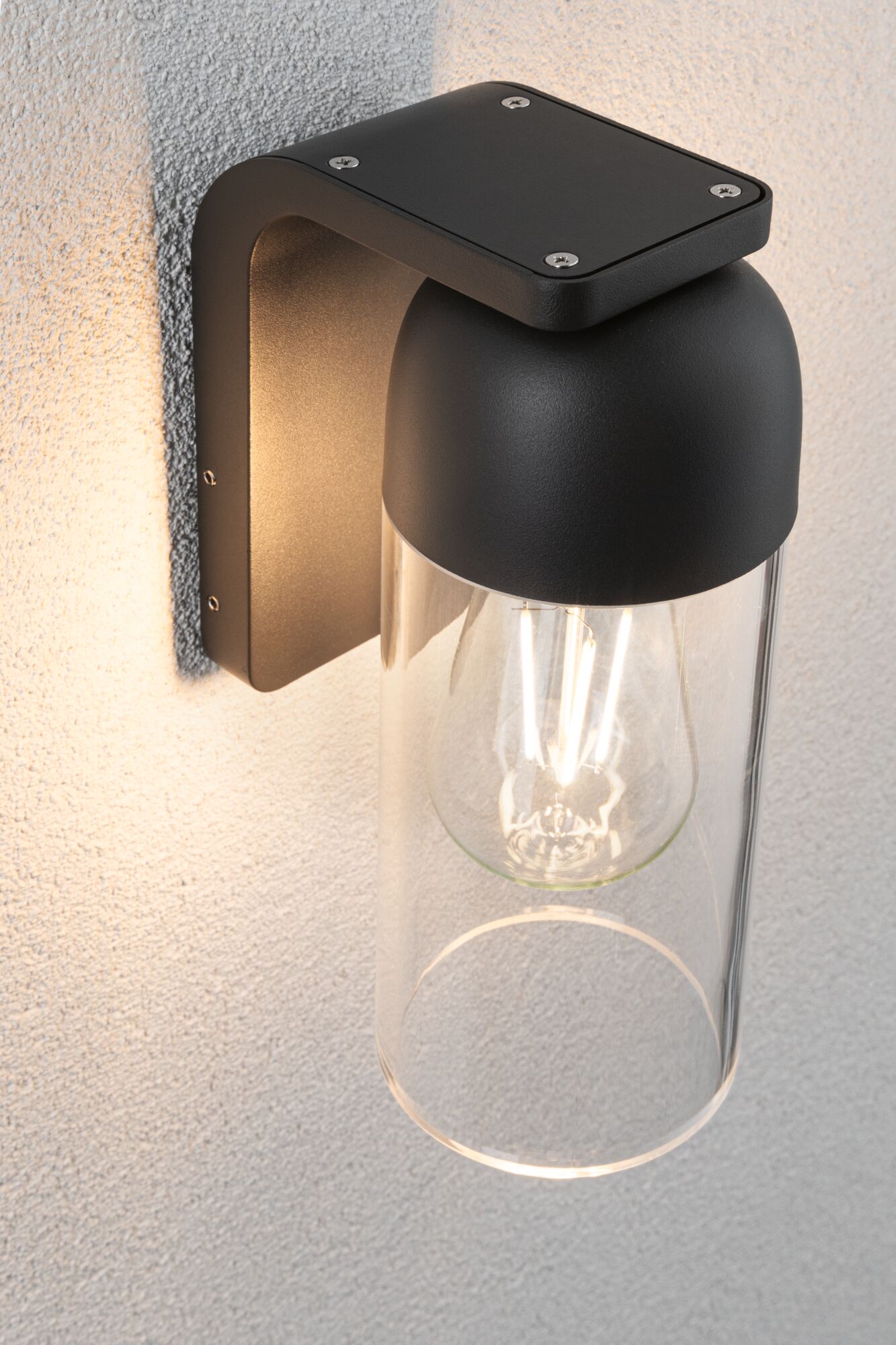 Schwarze Wandlampe aus Metall mit klarem Glaszylinder und sichtbarer LED-Glühbirne für Außenbeleuchtung