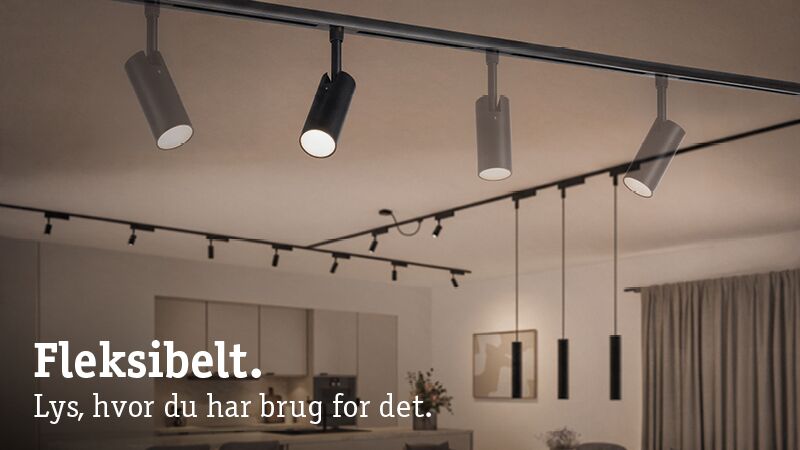 Fleksibelt sort og gråt skinne belysningssystem med LED-spotlys i moderne opholdsrum til tilpasset belysning