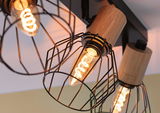 Plafondspot met hout en zwart metalen kooi, warm wit licht, moderne woonverlichting