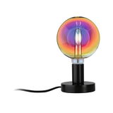 Modern table lamp with black metal base and colorful glass bulb for ambient lighting in living spaces