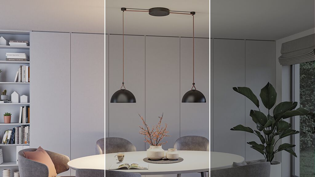 Moderne eetruimte met witte tafel, twee zwarte metalen hanglampen en grijze stoelen in minimalistische kamer