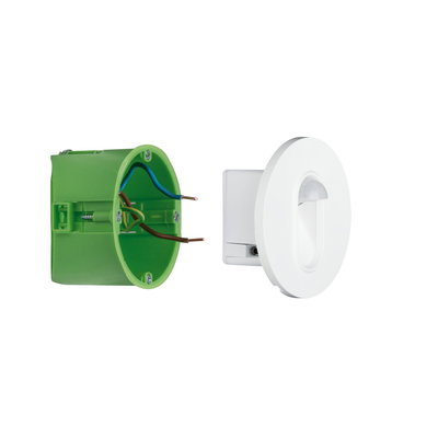Witte bewegingssensor met groene kunststof inbouwdoos voor slimme lichtregeling