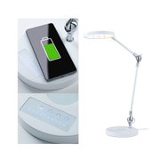 White LED desk lamp with adjustable arm and wireless smartphone charging pad integrated in base