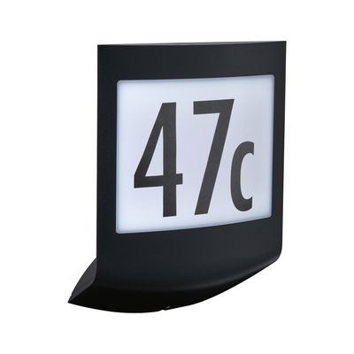 Black LED house number sign with white background and large black digits for outdoor lighting