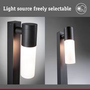 Black metal outdoor wall light with white glass, modern LED lighting for home facades