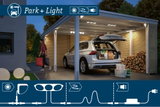 Illuminated carport with white SUV and Park+Light LED lighting system for outdoor parking areas.