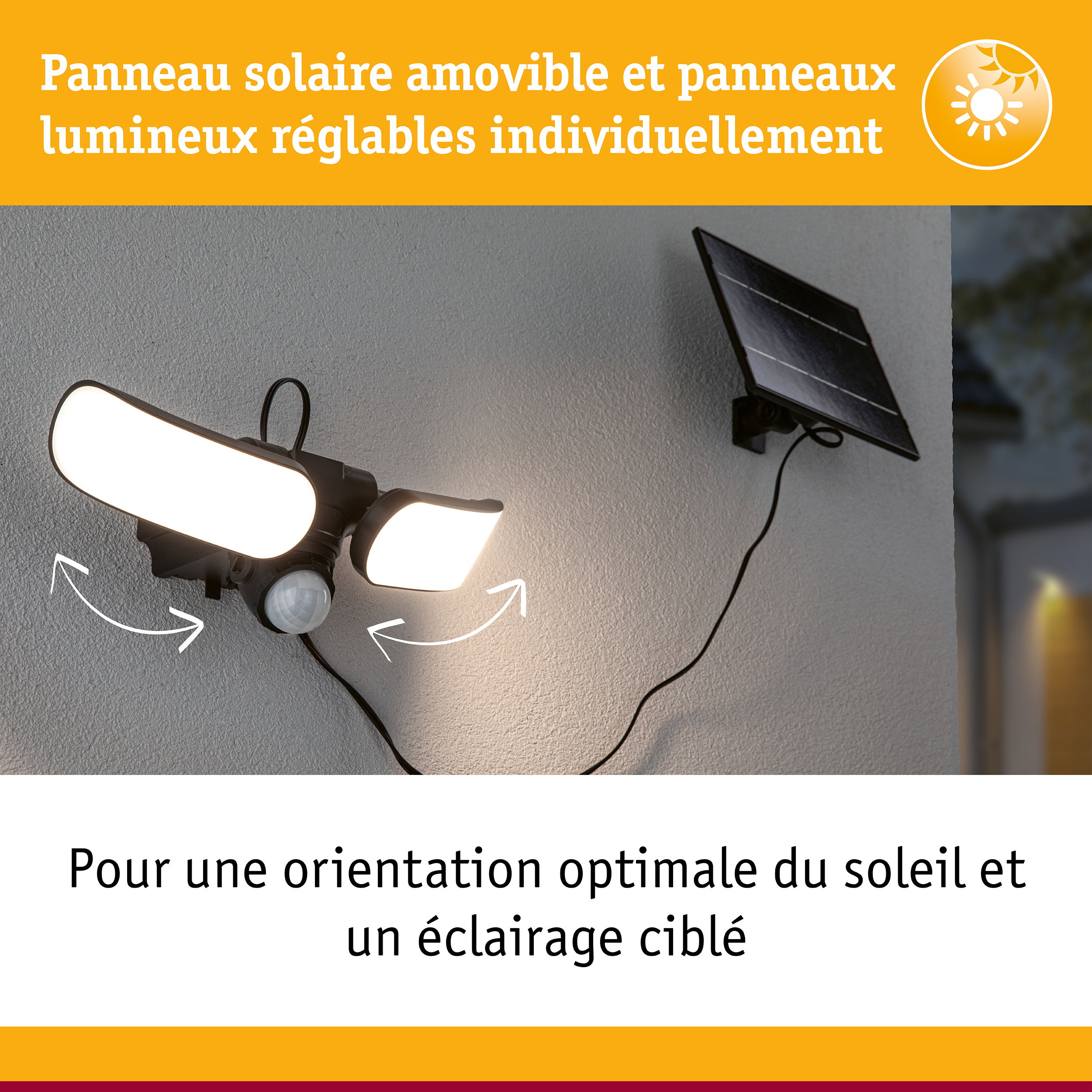 Lampe solaire noire avec panneaux LED réglables et panneau solaire fixée sur mur gris extérieur