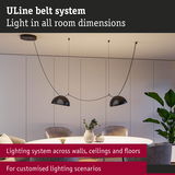 ULine Belt System with black pendant lights over round dining table for customizable room lighting