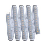Flexible LED light strip with warm white diodes and adhesive backing for versatile lighting solutions.