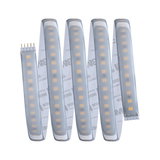 Flexible LED light strip with warm white diodes and adhesive backing for versatile lighting solutions.