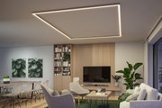 Moderne woonkamer met vierkante warmwitte LED-plafondlamp, houten kast en groen tapijt.