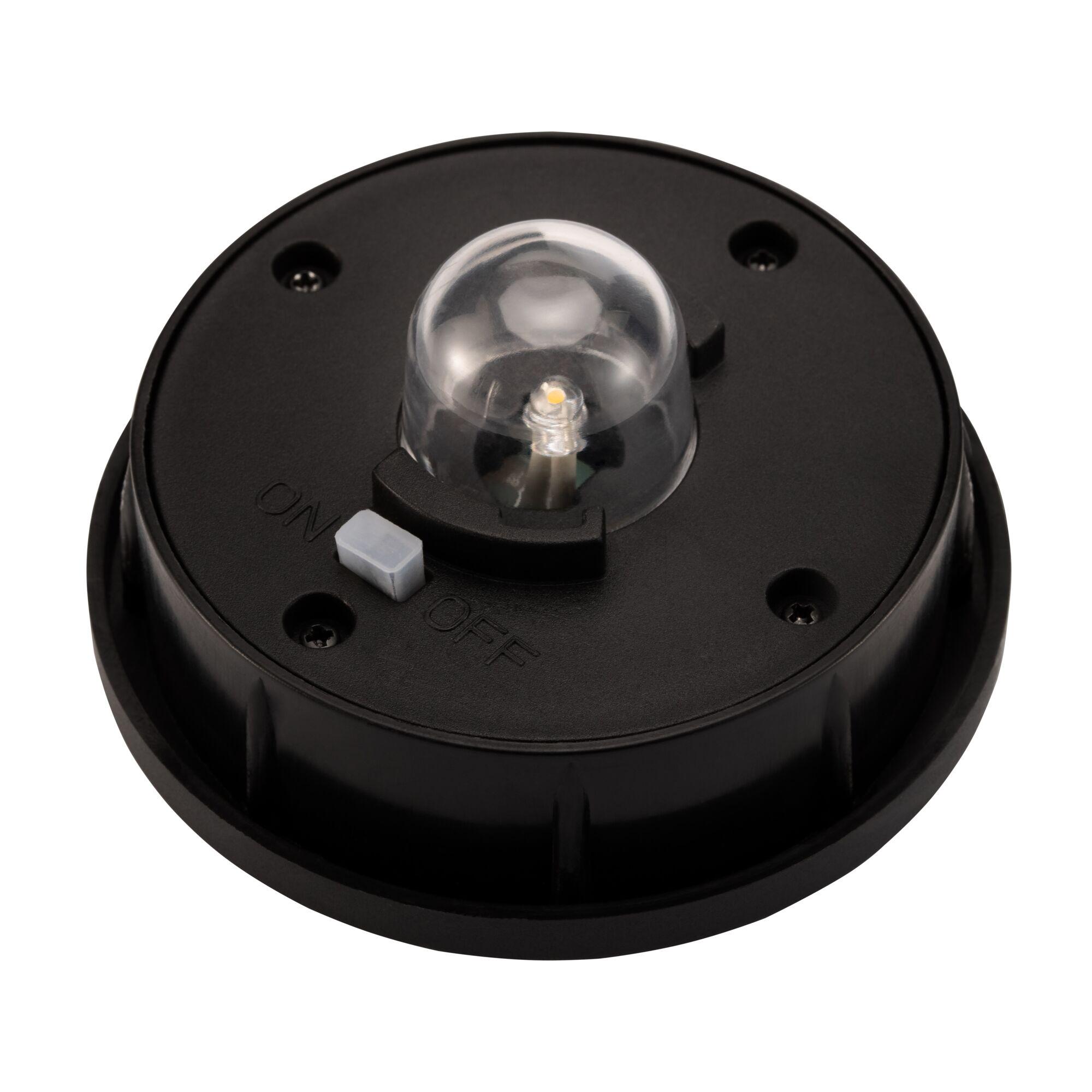 Black plastic housing with clear LED sensor and on/off switch for lighting technology use